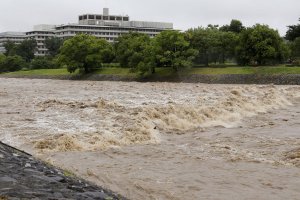 Typhoon forces Japan to evacuate over two million people while heavy rain shuts down parts of Taiwan